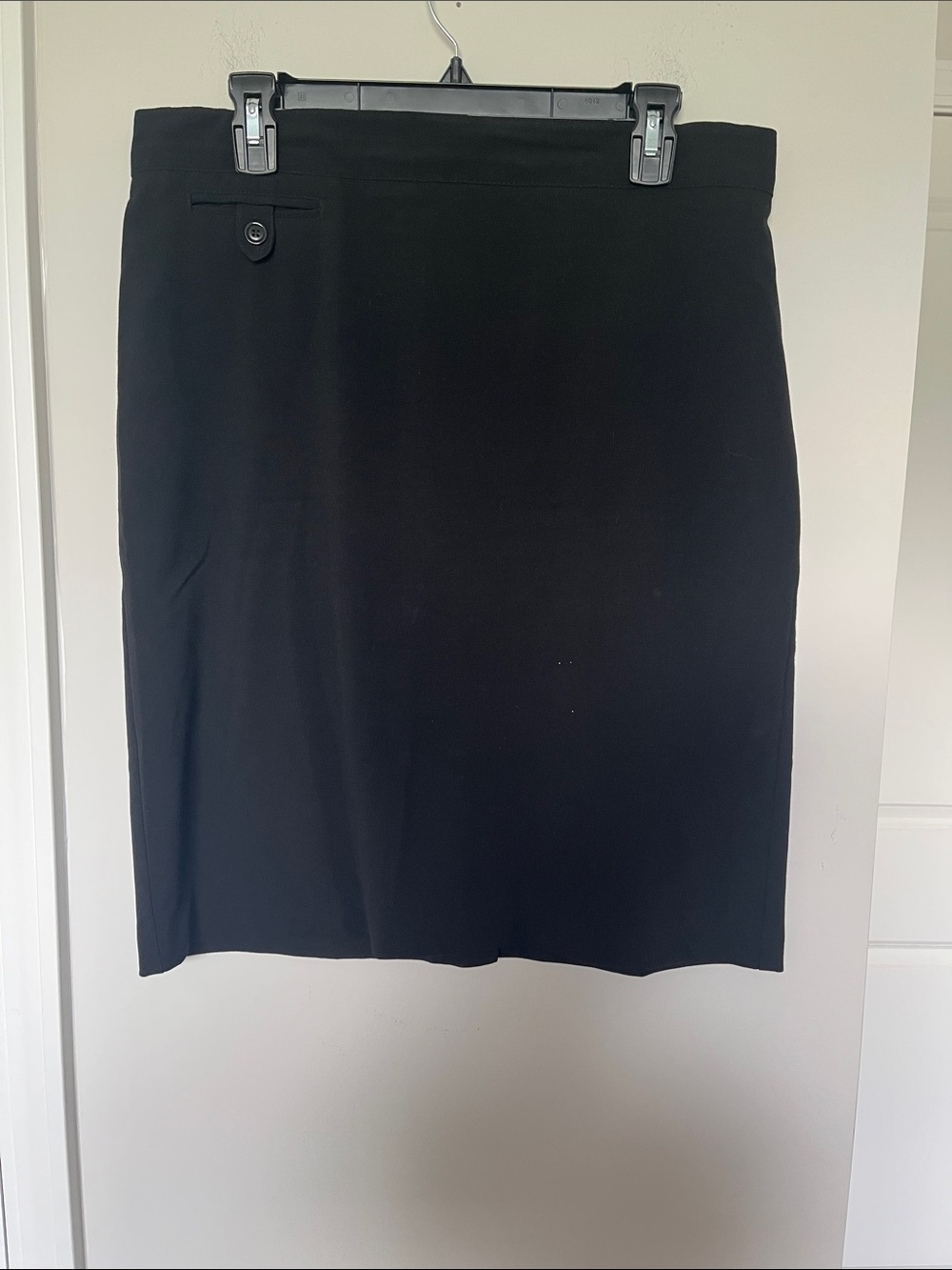 Counterparts Black Pencil Skirt with Waist Button Accent. Knee length